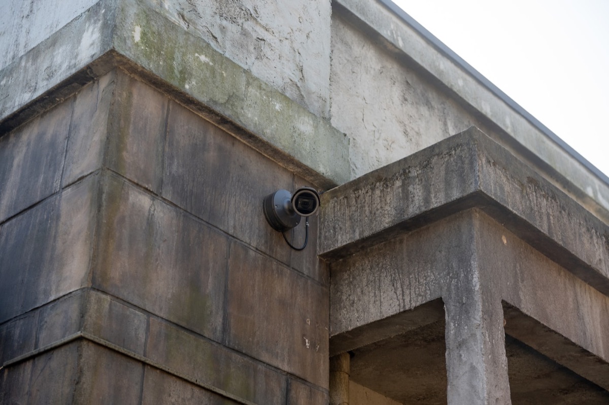 Security monitoring desk with active screens